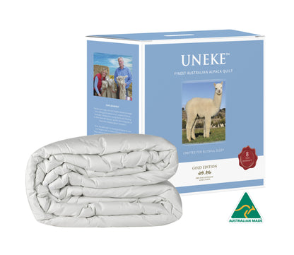 Uneke alpaca quilt with packaging and Australian Made logo on a white background